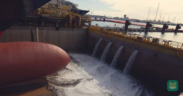 Water floods the dry dock at Sestri Ponente during the Explora V float-out