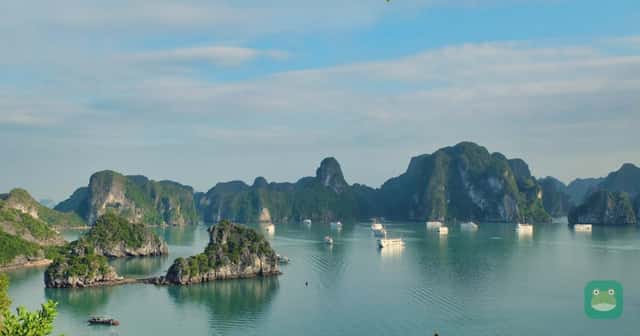 Asia — limestone karsts over calm water in Ha Long Bay, Vietnam